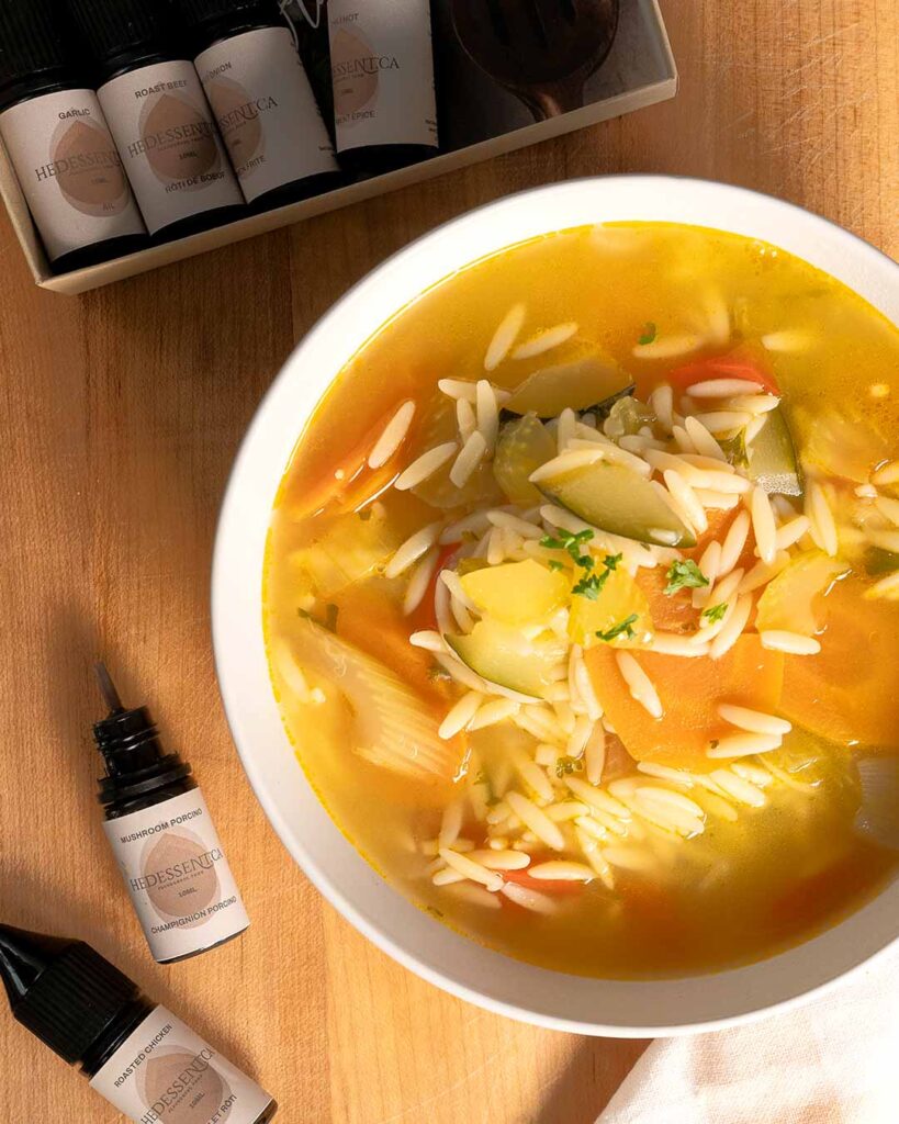 Veggie Orzo soup on table